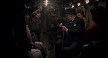 Movie still from “Darkest Hour” (2017), directed by Joe Wright – Medium shot, High angle