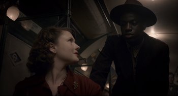 Movie still from “Darkest Hour” (2017), directed by Joe Wright – Medium shot, Over the shoulder angle