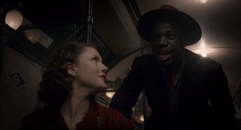 Movie still from “Darkest Hour” (2017), directed by Joe Wright – Medium shot, Over the shoulder angle