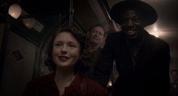 Movie still from “Darkest Hour” (2017), directed by Joe Wright – Medium shot, Over the shoulder angle