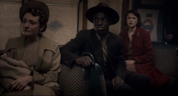 Movie still from “Darkest Hour” (2017), directed by Joe Wright – Medium shot, High angle