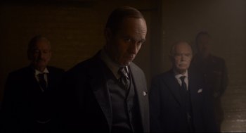 Movie still from “Darkest Hour” (2017), directed by Joe Wright – Medium shot, Over the shoulder angle