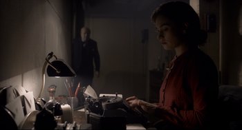 Movie still from “Darkest Hour” (2017), directed by Joe Wright – Medium shot, Over the shoulder angle