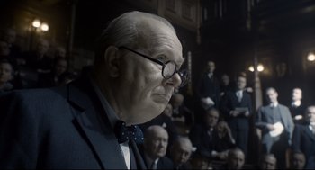 Movie still from “Darkest Hour” (2017), directed by Joe Wright – Close Up shot, Over the shoulder angle