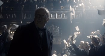 Movie still from “Darkest Hour” (2017), directed by Joe Wright – Medium shot, Low angle
