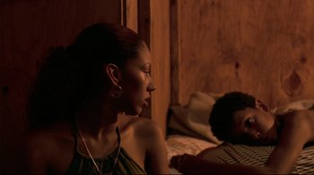 Movie still from “Chop Shop” (2007), directed by Ramin Bahrani – A woman sitting on a bed next to another woman; Close Up shot, Over the shoulder angle