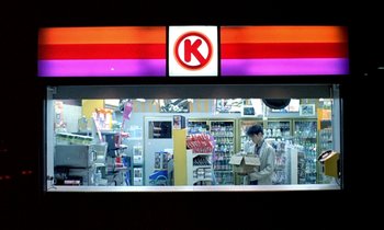 Movie still from “Chungking Express” (1994), directed by Kar-Wai Wong – A man standing in front of a store window; Wide shot, Low angle