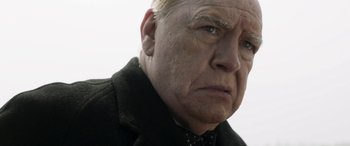 Movie still from “Churchill” (2017), directed by Jonathan Teplitzky – An older man with a frowning look on his face; Close Up shot, Low angle