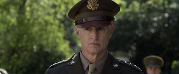 Movie still from “Churchill” (2017), directed by Jonathan Teplitzky – A person wearing a uniform; Close Up shot, Low angle