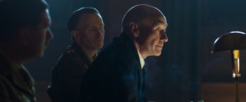 Movie still from “Churchill” (2017), directed by Jonathan Teplitzky – A man with a bald head and a man with a bald head; Close Up shot, Low angle