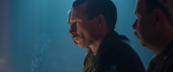 Movie still from “Churchill” (2017), directed by Jonathan Teplitzky – A person with his head turned to the side; Close Up shot, Low angle