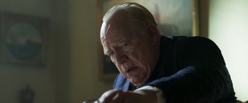 Movie still from “Churchill” (2017), directed by Jonathan Teplitzky – An older man sitting in front of a painting; Close Up shot, Low angle