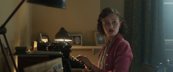 Movie still from “Churchill” (2017), directed by Jonathan Teplitzky – A young woman is typing on an old fashioned typewriter; Close Up shot, Over the shoulder angle