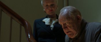 Movie still from “Churchill” (2017), directed by Jonathan Teplitzky – An older man and a younger woman looking at each other; Medium shot, Low angle