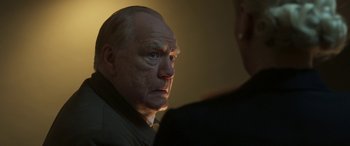 Movie still from “Churchill” (2017), directed by Jonathan Teplitzky – An older man looking at another man in a suit; Close Up shot, Over the shoulder angle