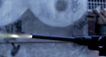 Movie still from “City of God” (2002), directed by Kátia Lund – A brush on a metal surface; Extreme Close Up shot, Low angle