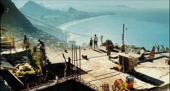 Movie still from “City of Men” (2007), directed by Paulo Morelli – A group of people standing on top of a building; Extreme Wide shot, High angle