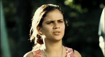 Movie still from “City of Men” (2007), directed by Paulo Morelli – A young woman is looking at the camera; Close Up shot, Low angle
