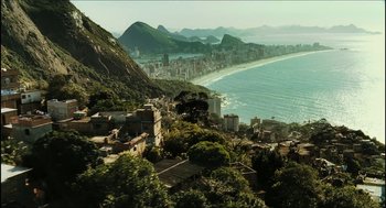 Movie still from “City of Men” (2007), directed by Paulo Morelli – An aerial view of a city and a body of water; Extreme Wide shot, High angle