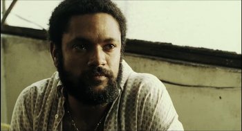 Movie still from “City of Men” (2007), directed by Paulo Morelli – A person with a beard; Close Up shot, Low angle