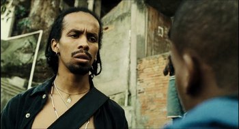 Movie still from “City of Men” (2007), directed by Paulo Morelli – A person with a beard; Close Up shot, Low angle