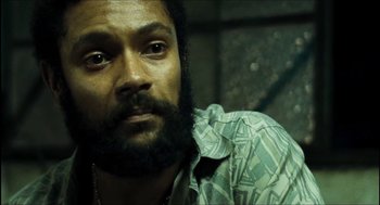 Movie still from “City of Men” (2007), directed by Paulo Morelli – A person with a beard; Close Up shot, High angle