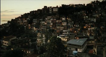 Movie still from “City of Men” (2007), directed by Paulo Morelli – A view of a city at night from a hill; Extreme Wide shot, High angle