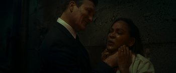 Movie still from “Day Shift” (2022), directed by J.J. Perry – A man and a woman are standing next to each other; Close Up shot, Over the shoulder angle