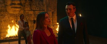 Movie still from “Day Shift” (2022), directed by J.J. Perry – A man and a woman standing next to each other; Medium shot, Over the shoulder angle