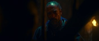 Movie still from “Day Shift” (2022), directed by J.J. Perry – A man with a beard is looking at the camera; Close Up shot, Over the shoulder angle