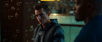 Movie still from “Day Shift” (2022), directed by J.J. Perry – A person wearing a sweater; Close Up shot, Over the shoulder angle