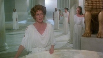 Movie still from “Clash of the Titans” (1981), directed by Desmond Davis – A group of people dressed in ancient roman clothing; Medium shot, High angle
