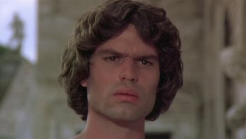 Movie still from “Clash of the Titans” (1981), directed by Desmond Davis – A person wearing a wig; Close Up shot, Low angle