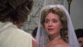 Movie still from “Clash of the Titans” (1981), directed by Desmond Davis – A woman in a wedding dress looking at a man; Close Up shot, Over the shoulder angle