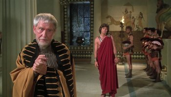 Movie still from “Clash of the Titans” (1981), directed by Desmond Davis – A man and a woman in ancient roman garb; Medium shot, Over the shoulder angle
