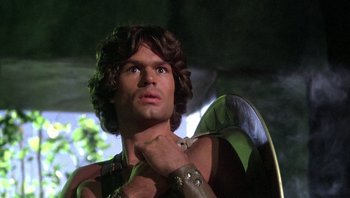 Movie still from “Clash of the Titans” (1981), directed by Desmond Davis – A person wearing a costume; Close Up shot, Low angle