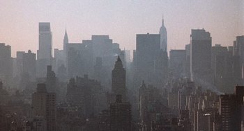 Movie still from “Class” (1983), directed by Lewis John Carlino – A view of a large city with a lot of buildings; Extreme Wide shot, High angle