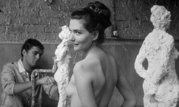 Movie still from “Cléo from 5 to 7” (1962), directed by Agnès Varda – A black - and - white photo of a woman in a bath tub; Medium shot, Low angle