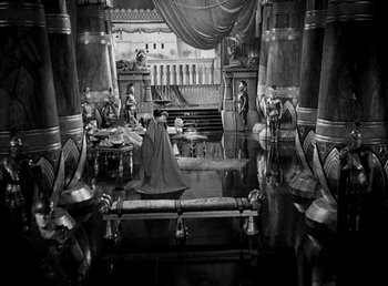 Movie still from “Cleopatra” (1934), directed by Cecil B. DeMille – A black - and - white photo of a scene in a movie; Extreme Wide shot, High angle