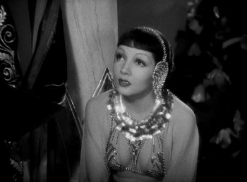 Movie still from “Cleopatra” (1934), directed by Cecil B. DeMille – An old photo of a woman wearing a necklace; Close Up shot, High angle