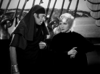 Movie still from “Cleopatra” (1934), directed by Cecil B. DeMille – A man and a woman are standing next to each other; Medium shot, High angle