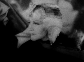 Movie still from “Cleopatra” (1934), directed by Cecil B. DeMille – A black - and - white photo of a woman's face; Close Up shot, High angle