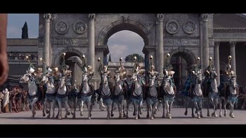 Movie still from “Cleopatra” (1963), directed by Rouben Mamoulian – A group of men riding on the backs of white horses; Extreme Wide shot, Low angle