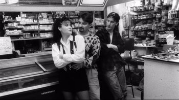 Movie still from “Clerks” (1994), directed by Kevin Smith – A group of people standing around in a store; Medium shot, Over the shoulder angle