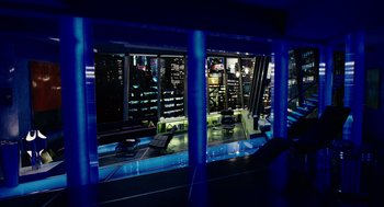 Movie still from “Click” (2006), directed by Frank Coraci – A view of a city at night through a window; Extreme Wide shot, High angle