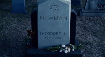 Movie still from “Click” (2006), directed by Frank Coraci – A headstone with a star of david on it; Close Up shot, Overhead angle