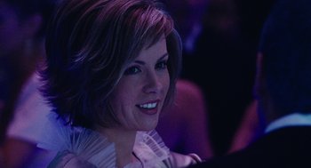 Movie still from “Click” (2006), directed by Frank Coraci – A person smiling at the camera; Close Up shot, Over the shoulder angle