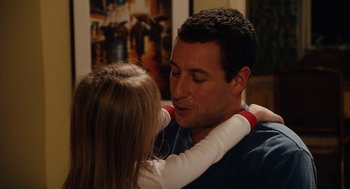 Movie still from “Click” (2006), directed by Frank Coraci – A man and a little girl hugging each other; Close Up shot, Over the shoulder angle