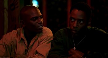 Movie still from “Clockers” (1995), directed by Spike Lee – A couple of men sitting next to each other; Close Up shot, Over the shoulder angle