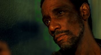 Movie still from “Clockers” (1995), directed by Spike Lee – A person looking at the camera; Close Up shot, Low angle